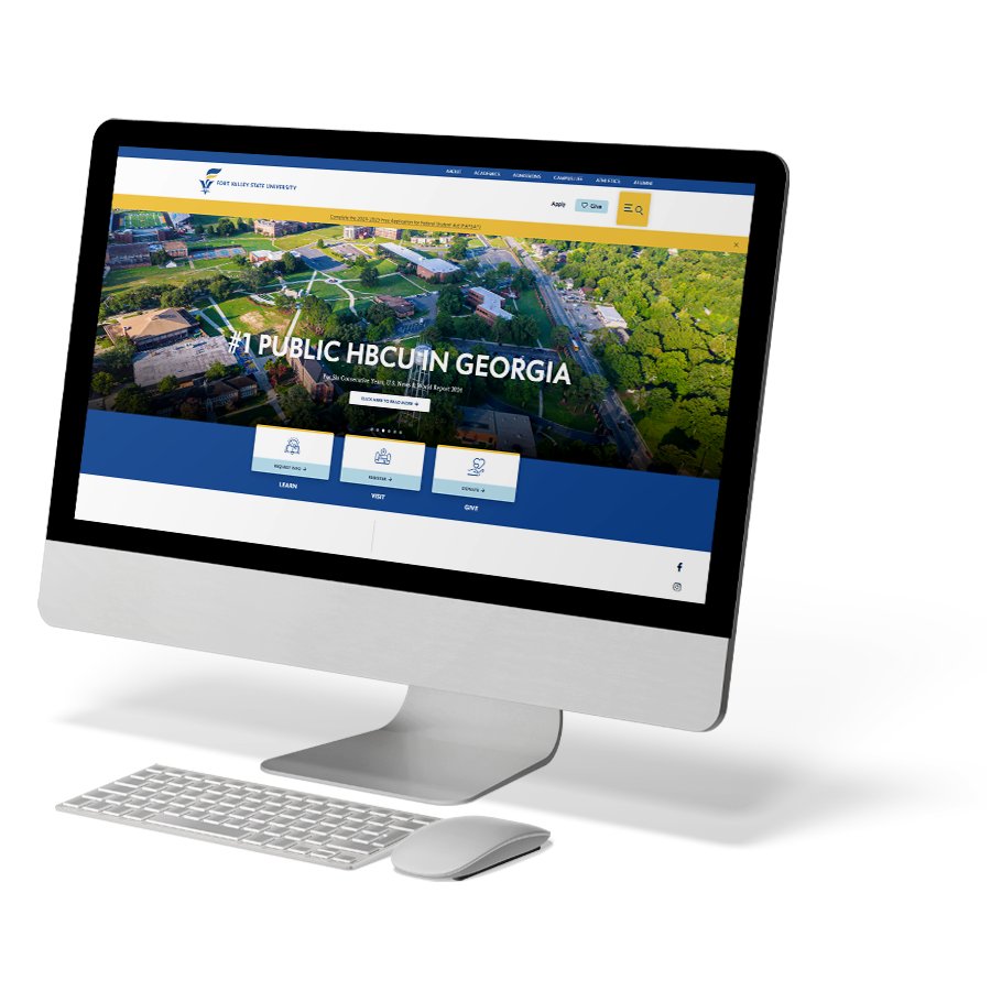 Desktop computer monitor displaying a university website